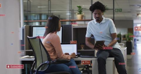Open-plan Office Collaboration with Dual Monitors and Tablet for Teamwork Productivity