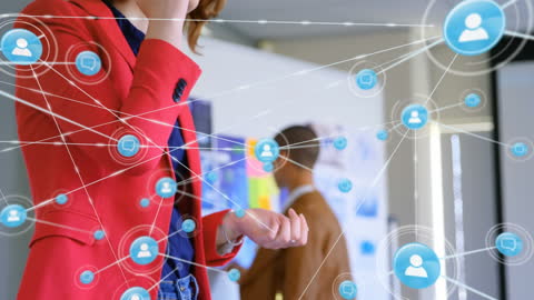 Businesswoman Communicating Using Advanced Networking Technology