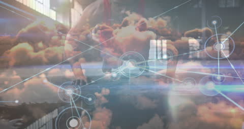 Digital Network Overlay with Fit Man Exercising in Clouds