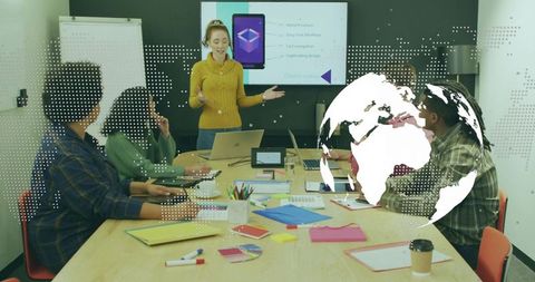 Team Meeting in Modern Office Featuring Global Connections