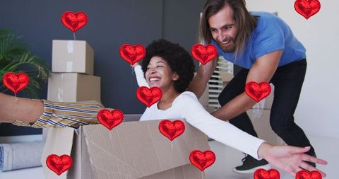 Joyful Couple Embracing New Home Adventure with Love and Heart Icons Decor