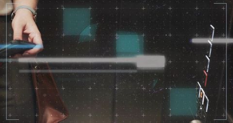 Left Hand Holding Smartphone in Modern Elevator with Digital Overlay