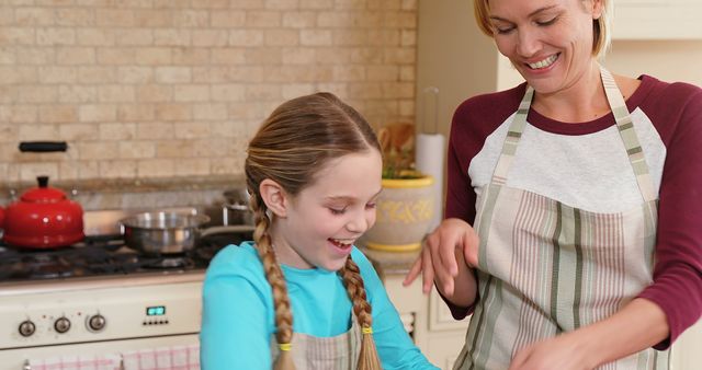 Happy Caucasian Mother and Daughter Baking Cake Together in Home Kitchen - Download Free Stock Images Pikwizard.com