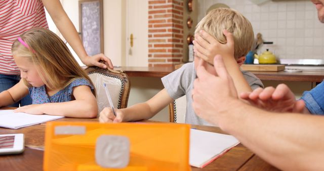 Frustrated Child Doing Homework with Family at Home - Download Free Stock Images Pikwizard.com