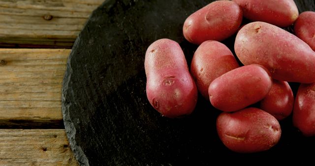 High angle view of sweet potatoes on concrete broad 4k