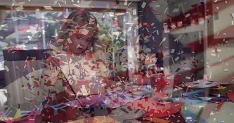 Child crafting with scissors and markers in artsy atmosphere