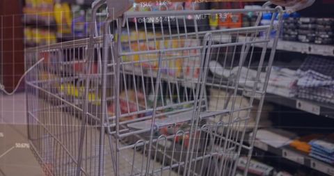 Metal shopping cart rolling down supermarket aisle with grid data overlay and reflections