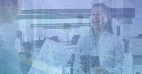 Collaborative women working in high-tech business environment