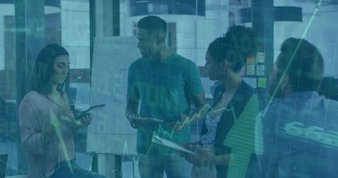 Diverse Team Discussing Business Strategy with Digital Technology