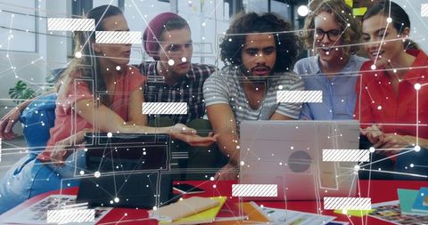 Diverse Team Collaborating on Project with Digital Interface Overlay