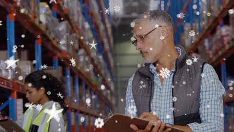 Warehouse Workers Analyzing Inventory Amid Snowflake Animation