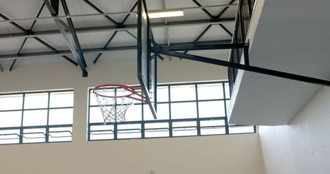 Indoor Basketball Hoop in Gymnasium with Suspended Ball - Download Free Stock Images Pikwizard.com