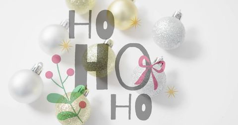 Festive christmas ornaments with holiday cheer text