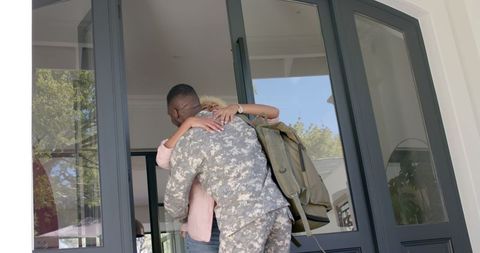 Military Homecoming Reunion Young Couple Embracing Outdoors