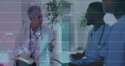 Diverse medical team reviewing health statistics and trends