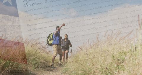 Couple Hiking with American Flag Overlay Symbolizing Patriotism