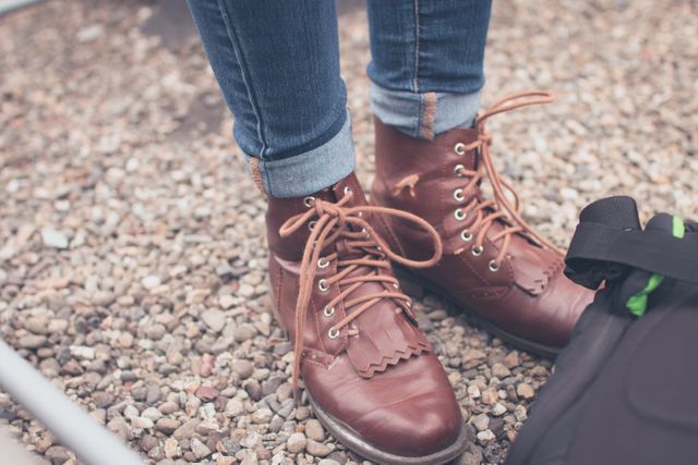 Ideal for themes related to outdoor fashion, casual wear, autumn style, footwear, and exploration. Perfect for articles on shoe trends, fashion blogs, or ads for outdoor apparel brands.