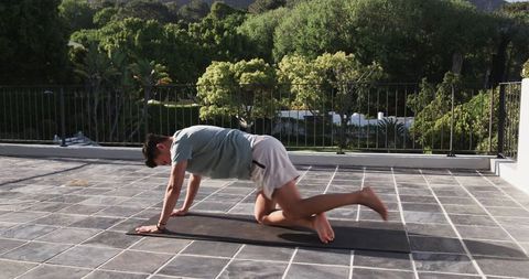 Dynamic Outdoor Plank Exercise on Terrace Yoga Workouts