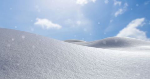 Tranquil Winter Landscape with Falling Snow under Blue Sky - Download Free Stock Images Pikwizard.com