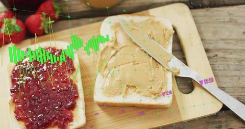 Preparing peanut butter and jam sandwich with augmented reality overlay