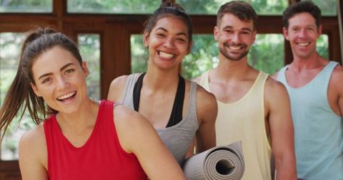 Diverse Group Smiling Post Yoga Class in Studio
