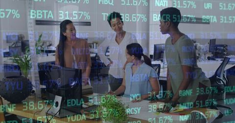Diverse Businesswomen Collaborating in Office with Financial Analysis Display