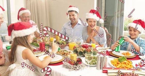 Happy Family Celebrating Christmas Dinner with Joy and Laughter