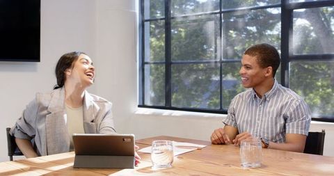 Diverse Colleagues Meeting in Modern Conference Room
