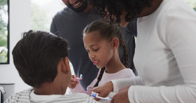 Family Morning Routine with Parents and Children Brushing Teeth - Download Free Stock Images Pikwizard.com