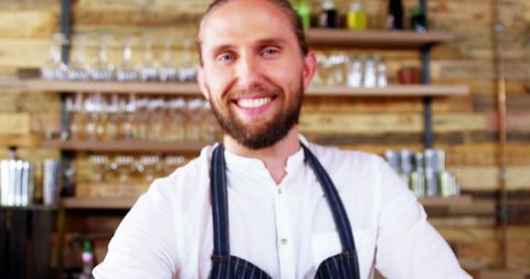 Friendly Barista Smiling in Rustic Coffee Shop