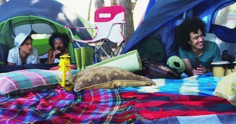 Diverse Friends Relaxing on Outdoor Camping Adventure