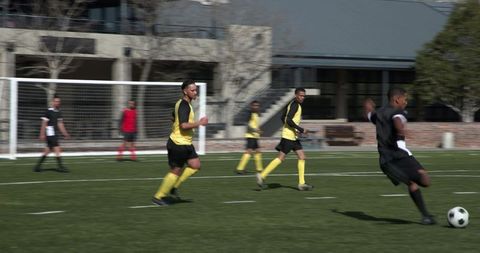 Intense Soccer Match Highlights Teamwork and Strategy