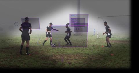 Soccer players practicing passing drill on foggy pitch with purple overlay analytics