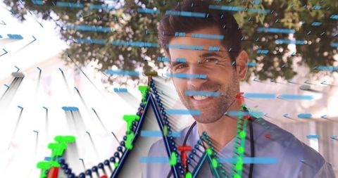 Smiling male doctor in blue scrubs presenting healthcare data visualization with charts