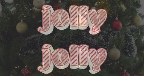 Jolly Holiday Text Over Festive Christmas Tree Decor