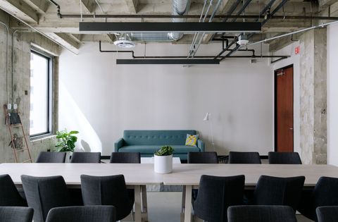 Modern industrial conference room with minimalist decor