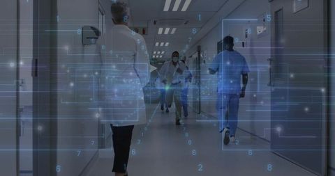 Hospital team hurrying down corridor with digital data overlay and augmented reality