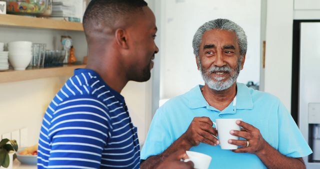 Smiling Father and Son Spending Time Together with Coffee - Download Free Stock Images Pikwizard.com