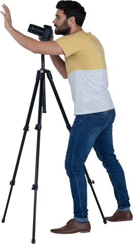 transparent image of male photographer adjusting stand camera - Download Free Stock Videos Pikwizard.com