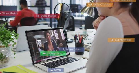 Businesswoman engaging in online meeting at modern office