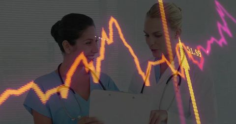 Healthcare professionals analyzing data with advanced technology visualization