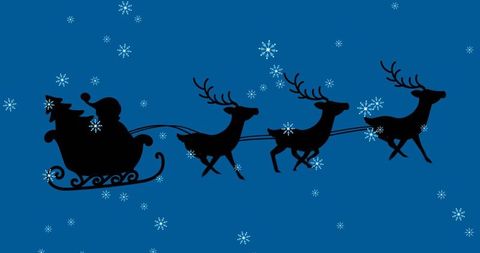 Santa sleigh silhouette flying with reindeer in night sky