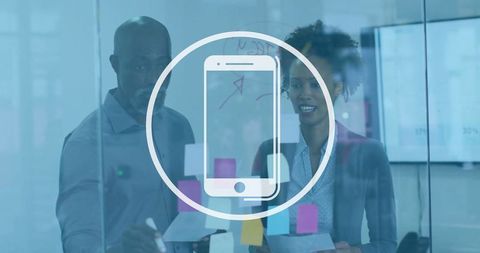 Coworkers collaborating in office with digital communication concept