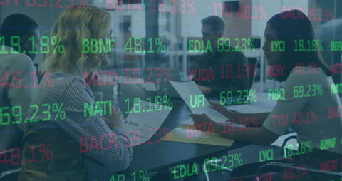 Business Team Collaborating Amid Digital Investment Data