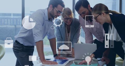 Colleagues Collaborating with Digital Technology Indoors