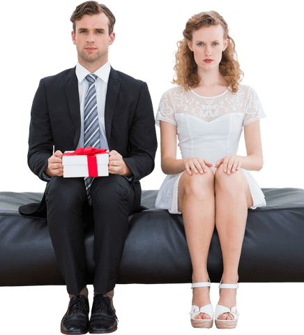 Transparent Couple with Gift Box Seated on Sofa