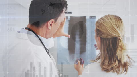 Doctors Analyzing X-ray with Data-Powered Interface Background