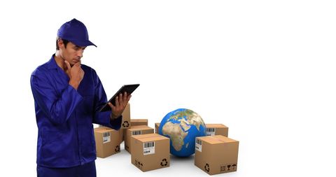 Warehouse Worker Using Tablet in Global Shipping Context