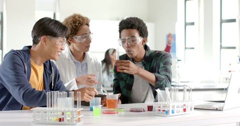 Teenagers Conducting Science Experiment in Classroom