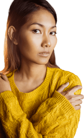 Transparent Asian Woman with Crossed Arms in Yellow Sweater